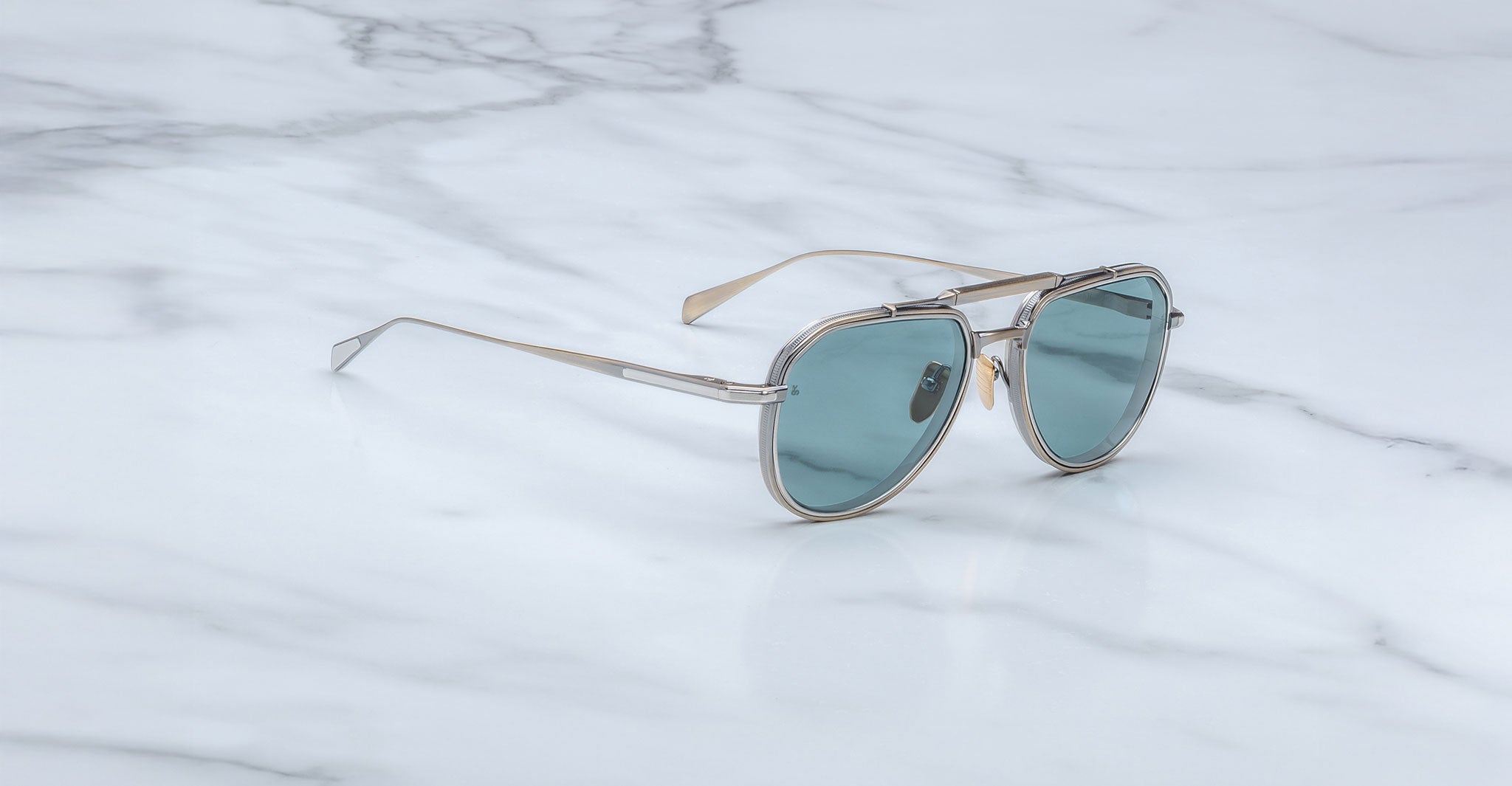 Jacques Marie Mage 755M silver aviator sunglasses with blue polarized lenses, front view.