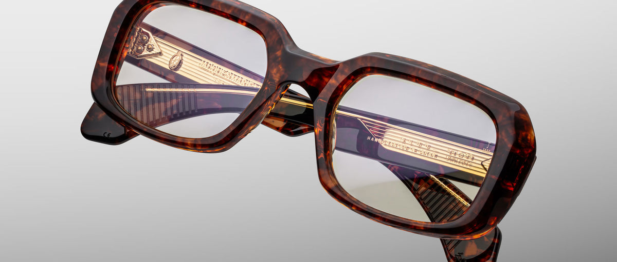 Jacques Marie Mage Aldo square tortoiseshell eyeglasses with gold temple accents, front-facing view.