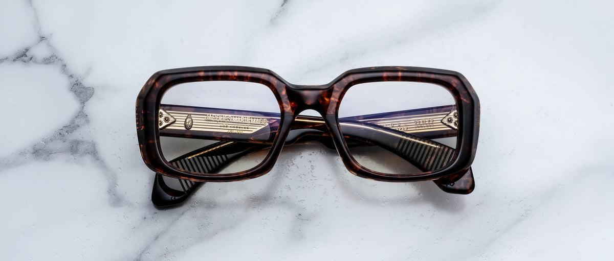 Jacques Marie Mage Aldo square tortoiseshell eyeglasses with gold arms, front view.