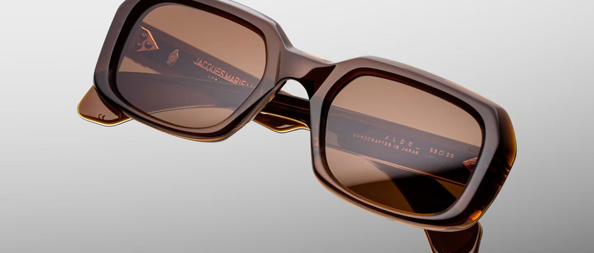 Jacques Marie Mage Aldo rectangular brown sunglasses with thick frames and tinted lenses, front view.