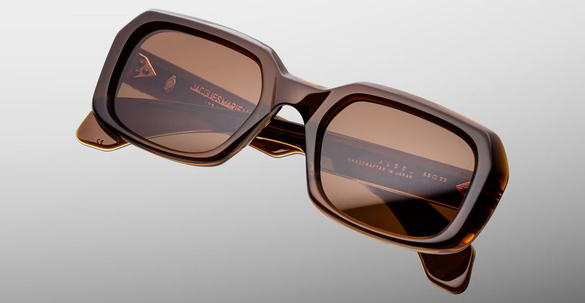 Jacques Marie Mage Aldo rectangular brown sunglasses with thick frames and tinted lenses, front view.