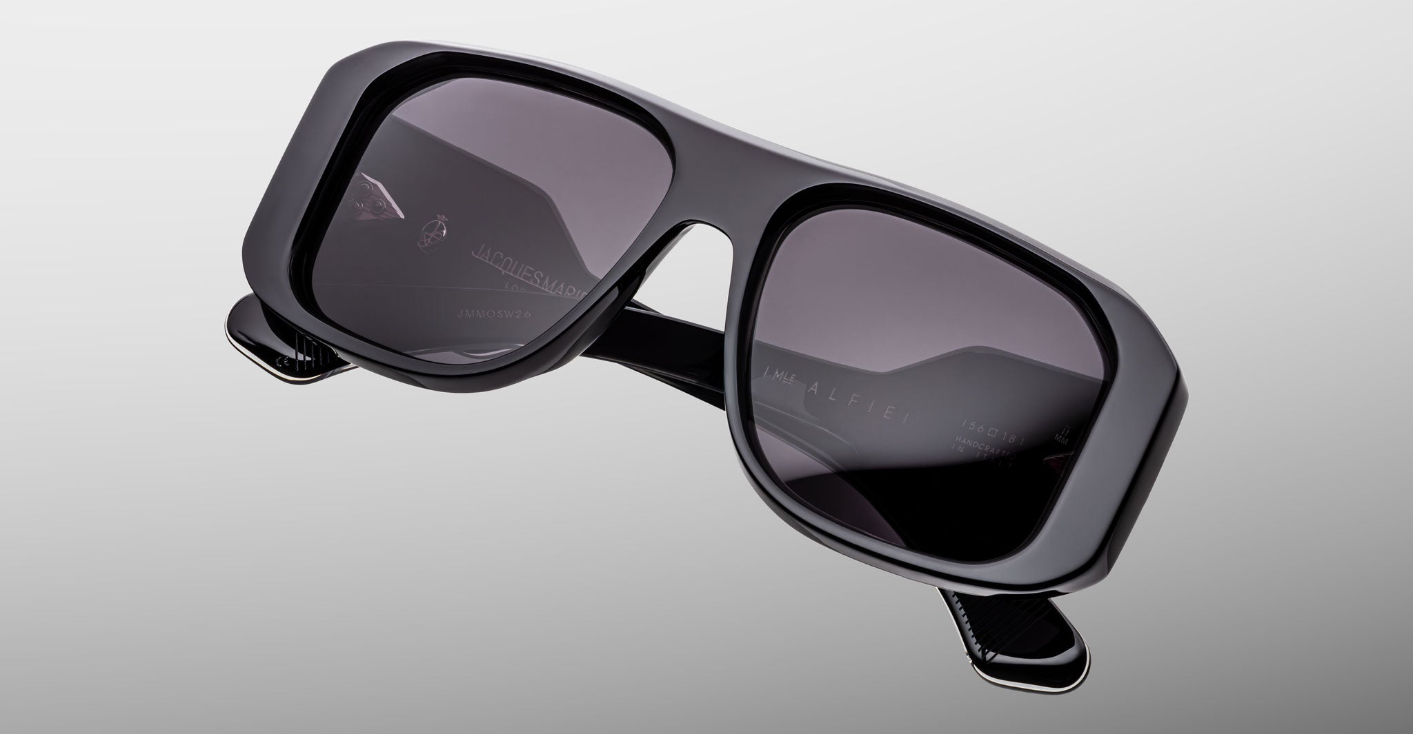 Jacques Marie Mage Alfie sunglasses with large rectangular black frames and dark lenses, shown from the front.