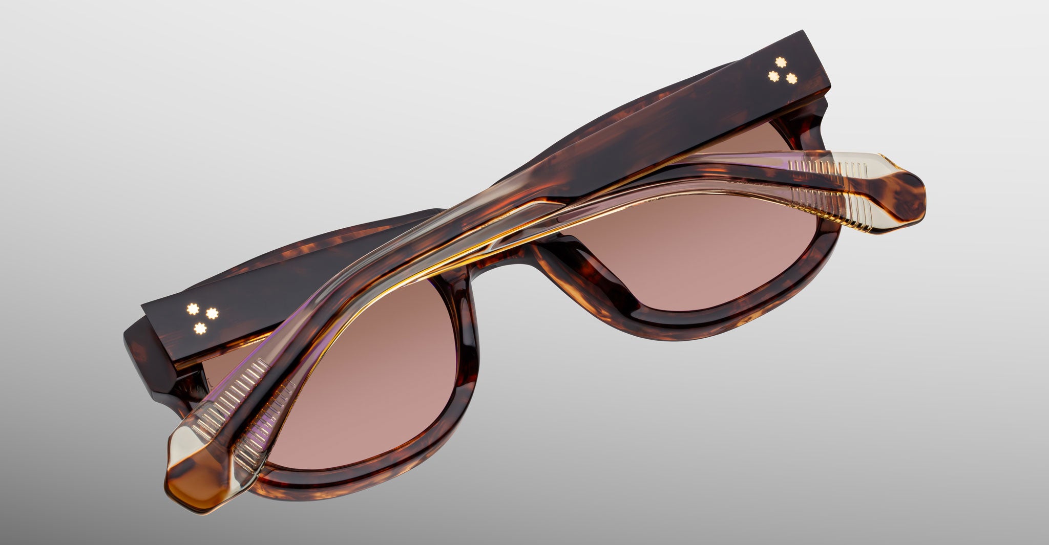 Jacques Marie Mage Amilcar tortoiseshell sunglasses with pink lenses, front angle.