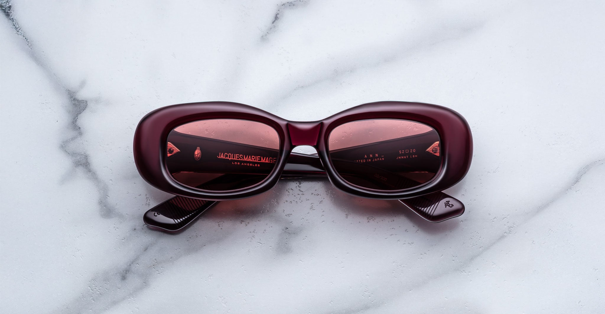 Jacques Marie Mage Ann in Amarena Red, front view with burgundy acetate frame and rose-tinted lenses