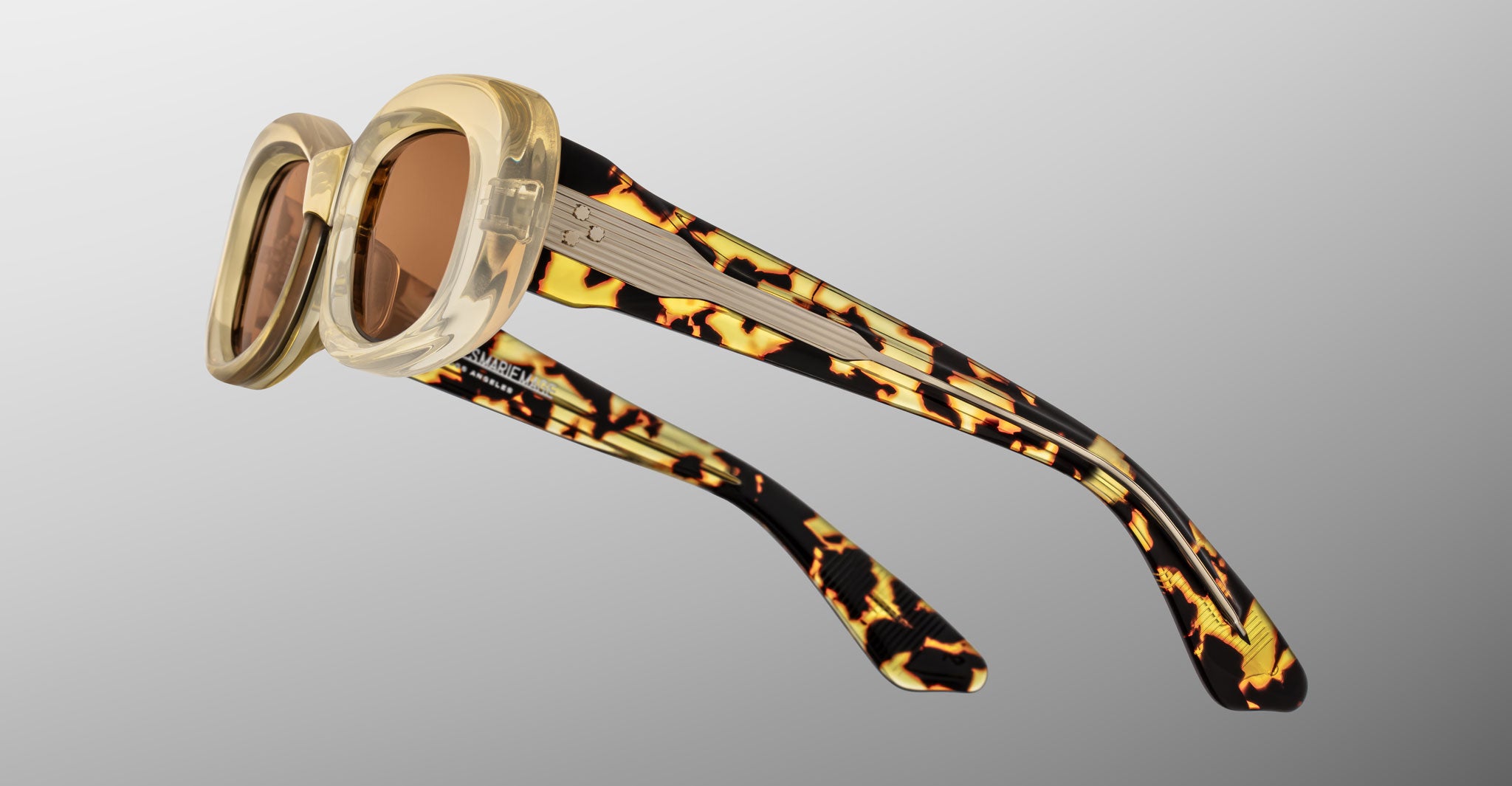 Jacques Marie Mage Ann in Dune, side angled view highlighting patterned temples and exposed wirecore detail