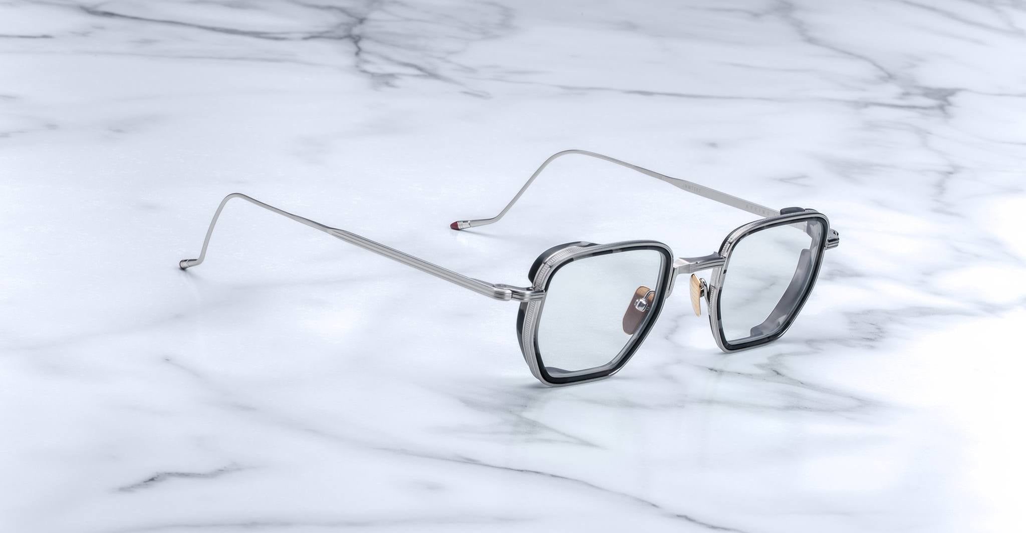 Jacques Marie Mage Atkins silver square eyeglasses with clear lenses, top view.