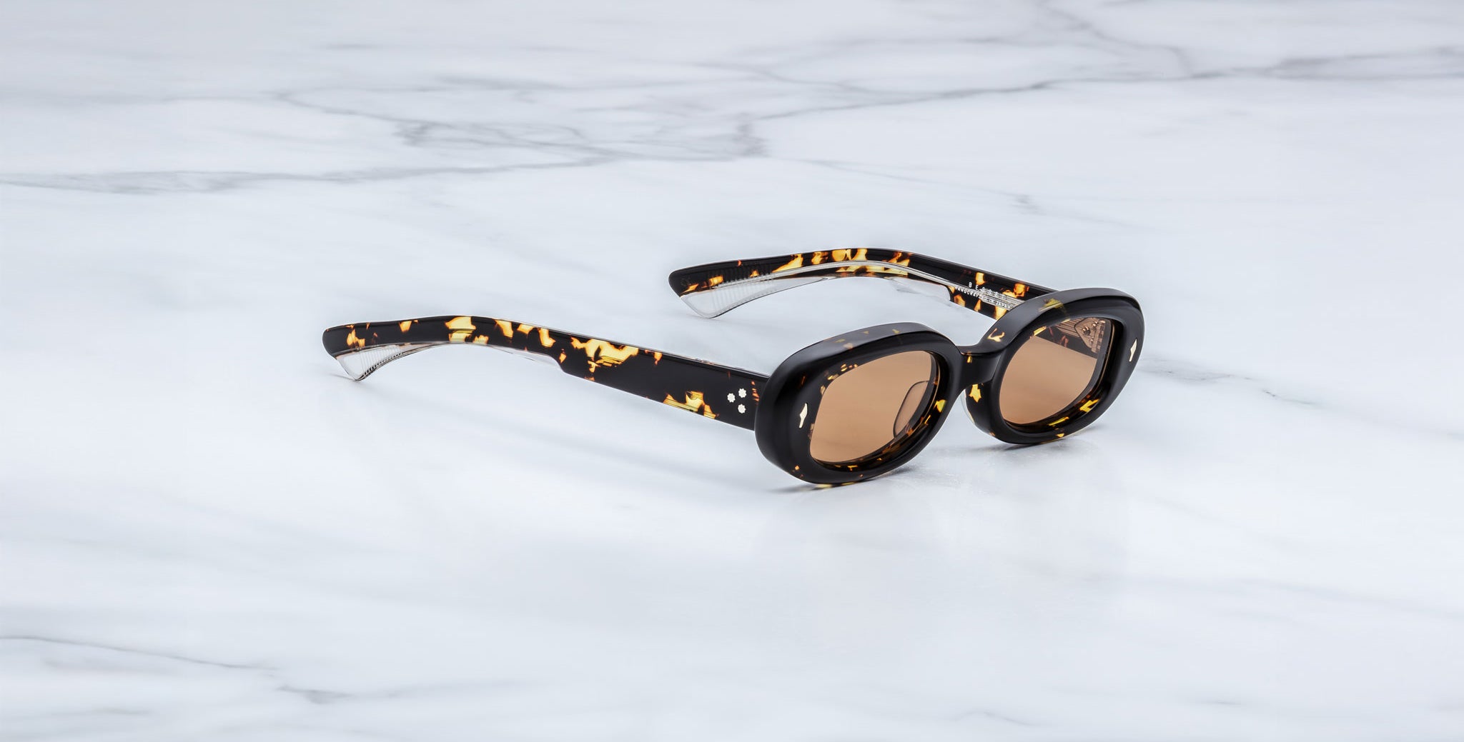 Jacques Marie Mage Besset sunglasses in brown and yellow tortoise shell pattern with orange lenses 3-4 view