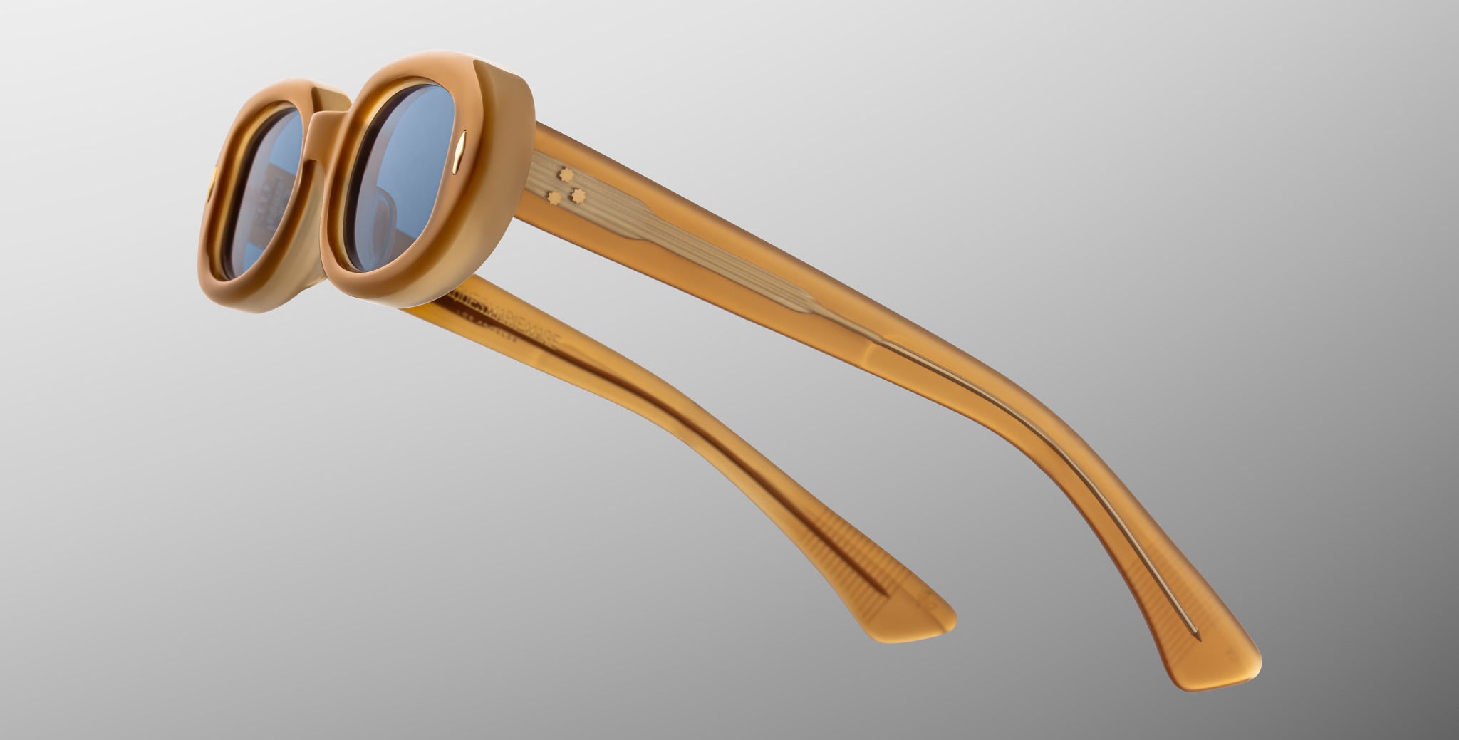 Jacques Marie Mage Besset sunglasses in tan with blue lenses close-up profile view