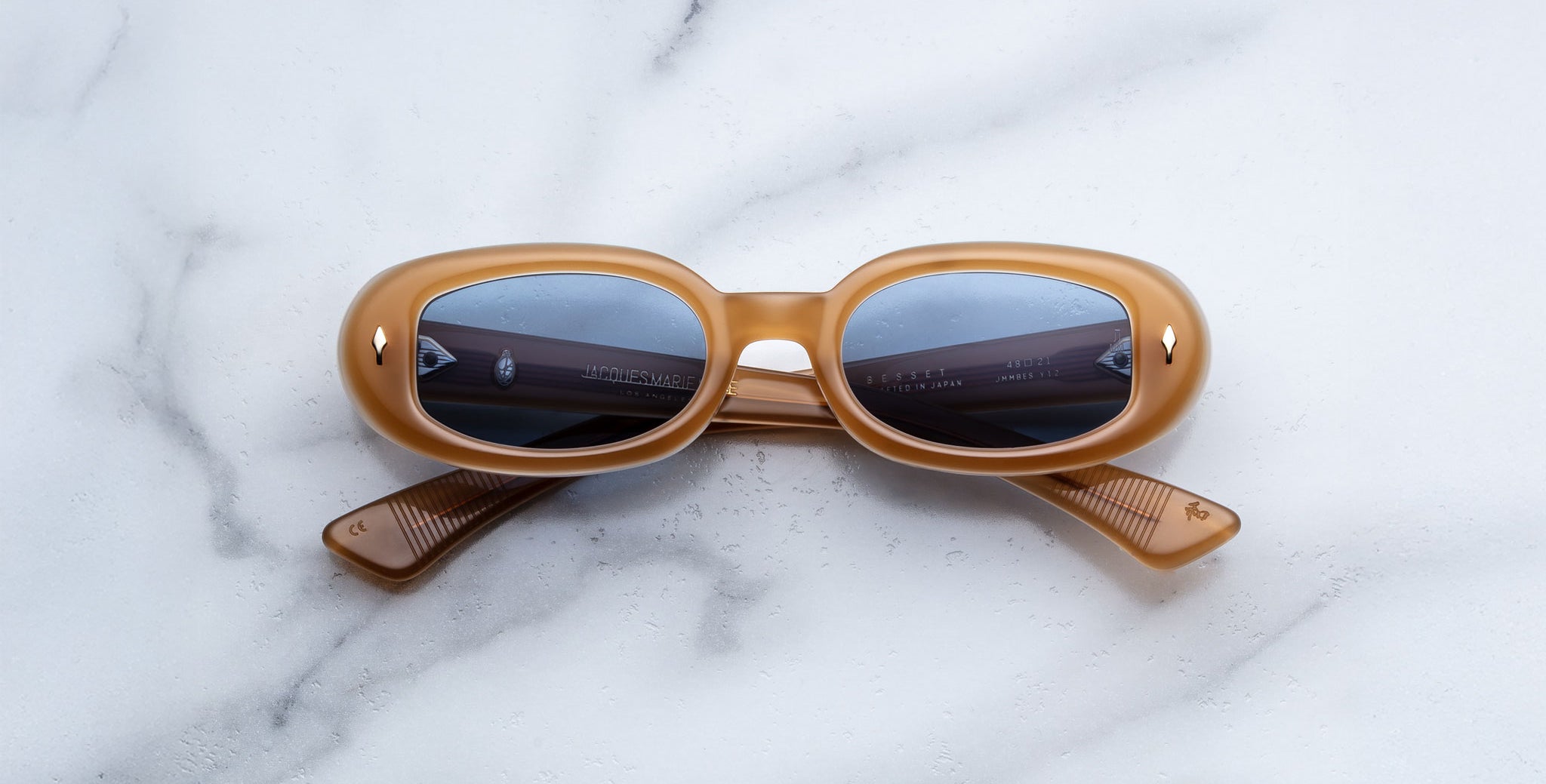 Jacques Marie Mage Besset sunglasses in tan with blue lenses front view