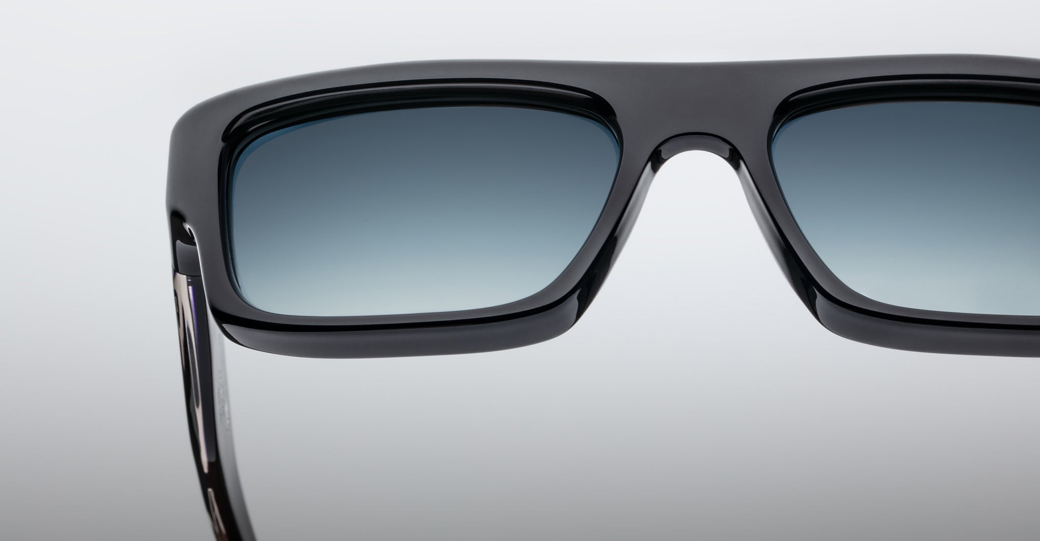 Close-up of Jacques Marie Mage Cleavon 57 black sunglasses with UV-protective lenses, front angle.