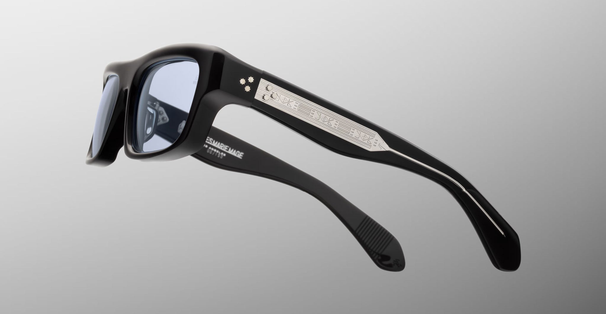 Jacques Marie Mage Cleavon 57 sunglasses, frontal view, black thick frames, silver arm accents, dark tinted lenses.