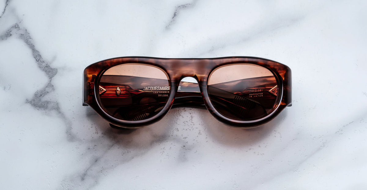 Jacques Marie Mage Clyde 2.0 in Bourbon brown acetate sunglasses with amber lenses viewed from the front