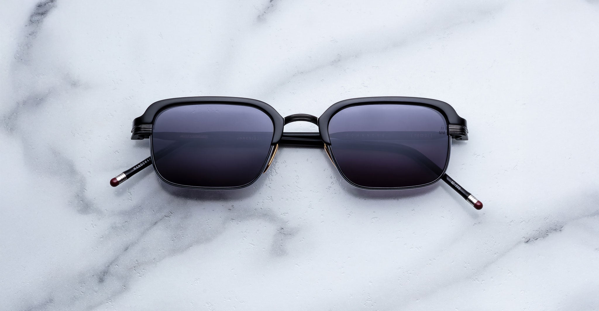 Jacques Marie Mage Comanche in Corbeau black rectangular sunglasses with dark lenses, front angle view, classic style eyewear.