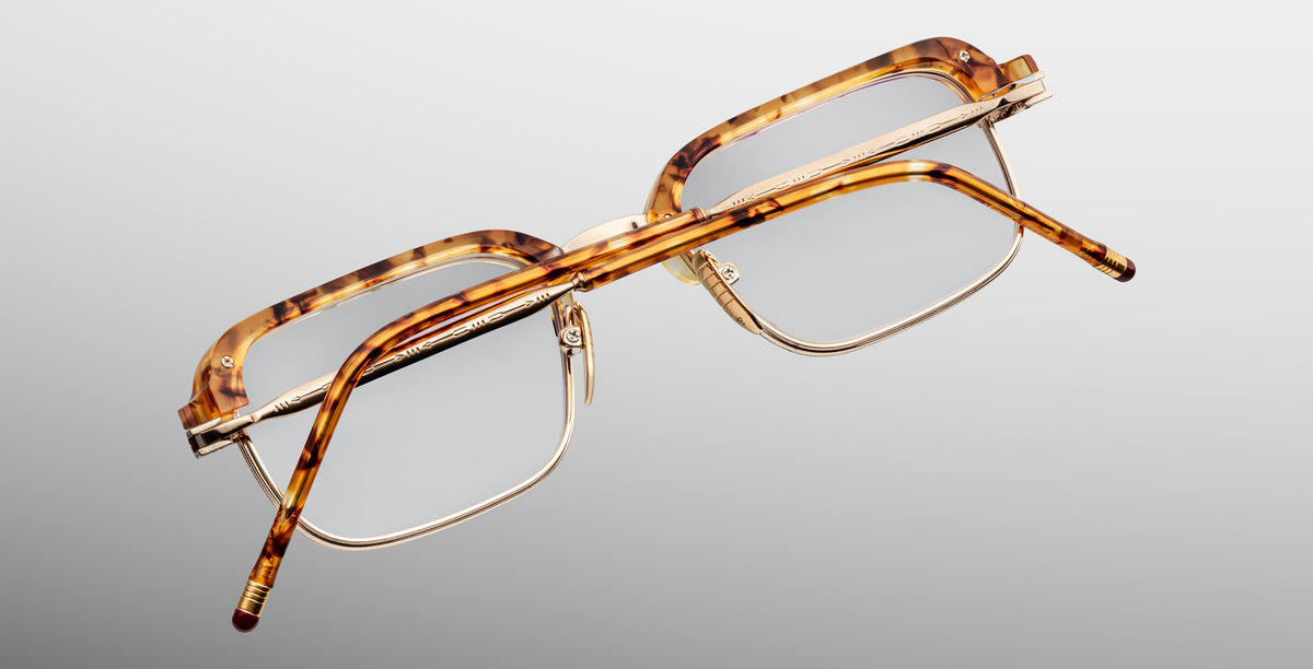 Jacques Marie Mage Comanche in Vintage Tortoise brown tortoiseshell and gold metal eyeglasses, viewed from the back, displaying sleek profile and temples.