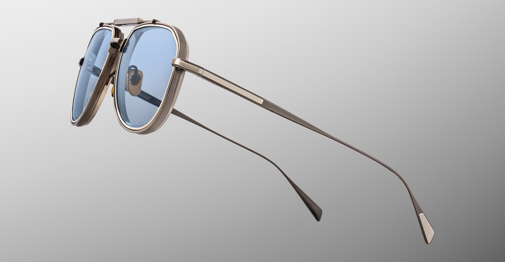 Angled side view of Jacques Marie Mage Commander in Antique Silver, highlighting the antique silver-tone titanium frame, engraved aviator rims, adjustable nose pads, and slender temples with sculpted tips and signature inlays.