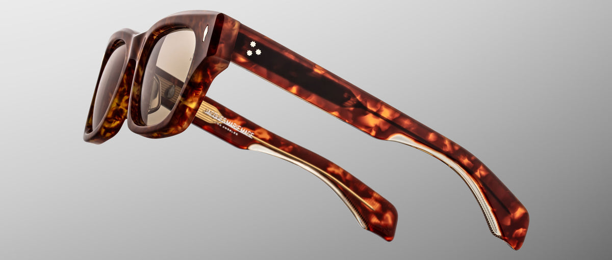 Jacques Marie Mage Dealan 53 sunglasses with square tortoiseshell frames, thick arms, and light brown lenses, front view.