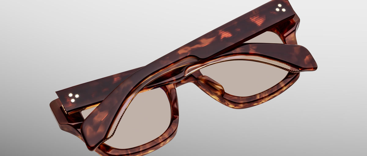 Jacques Marie Mage Dealan 53 tortoiseshell eyeglasses with thick frames, top-down view.