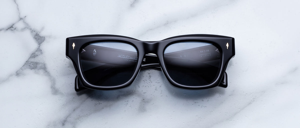 Jacques Marie Mage Dealan 53 black sunglasses with UV lenses, top view.
