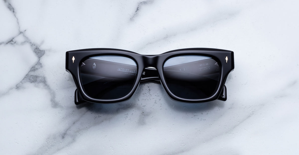 Jacques Marie Mage Dealan 53 black sunglasses with UV lenses, top view.