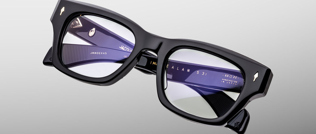 Jacques Marie Mage Dealan 53 black rectangular eyeglasses with thick frames, silver accents, and clear lenses, front view.
