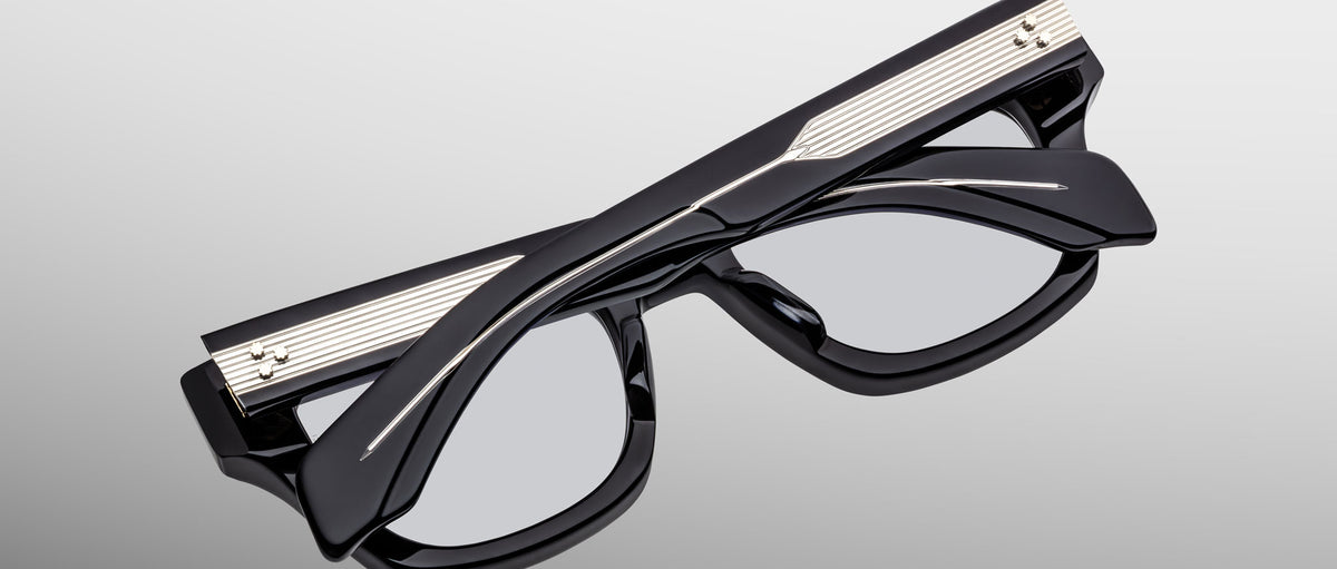 Jacques Marie Mage Dealan 53 black eyeglasses with silver temple accents, top view.