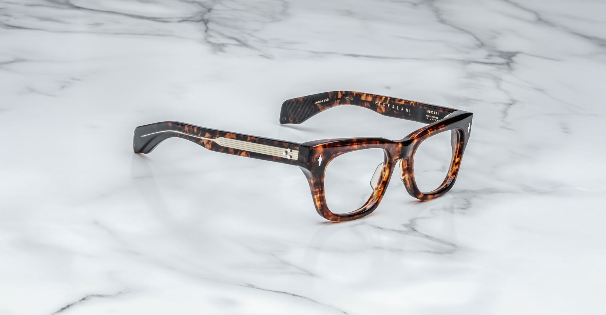 Jacques Marie Mage Dealan tortoiseshell eyeglasses with thick frames, front view.