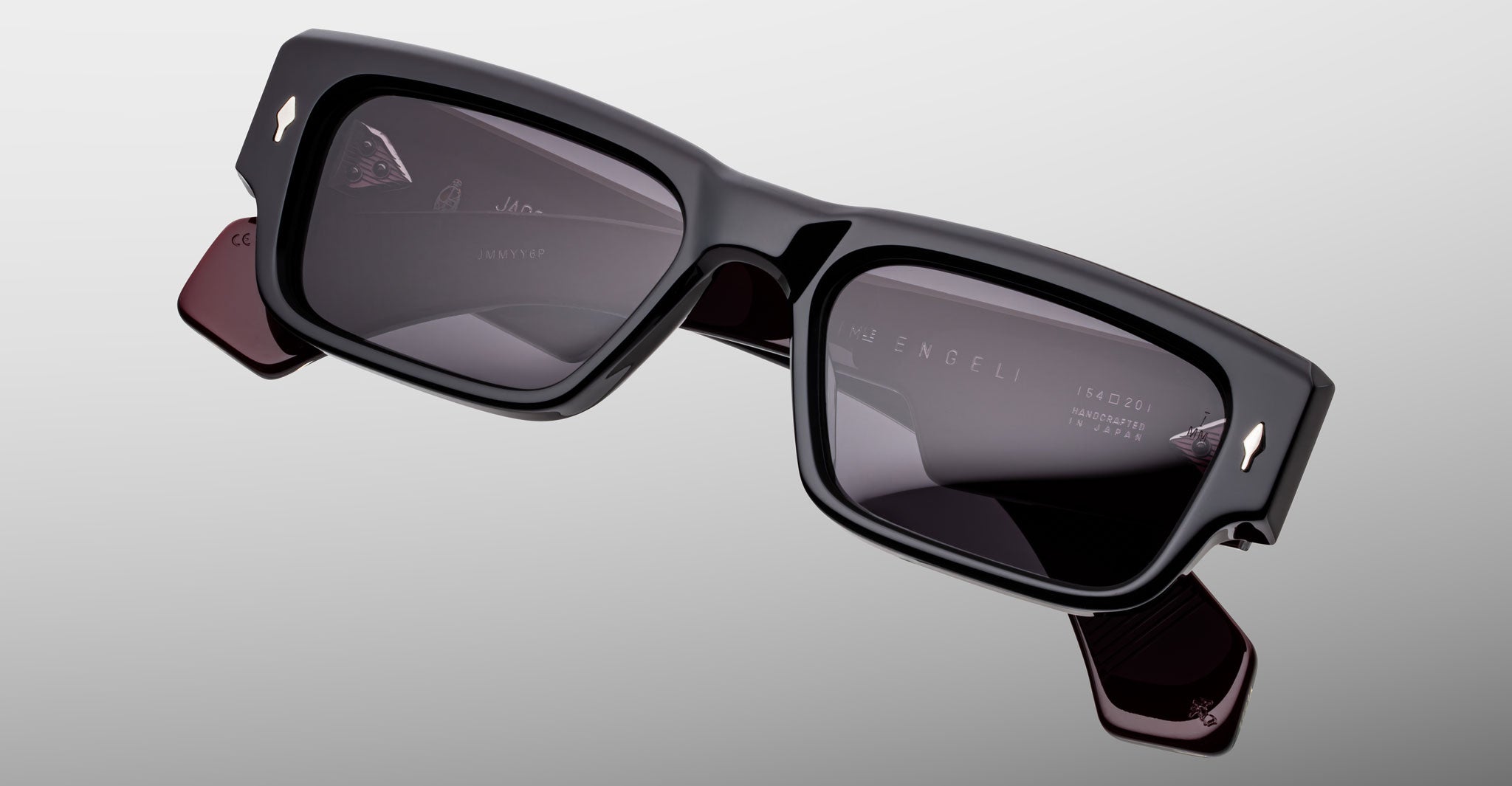 Jacques Marie Mage Engel rectangular black sunglasses with thick frames and UV lenses, front view.