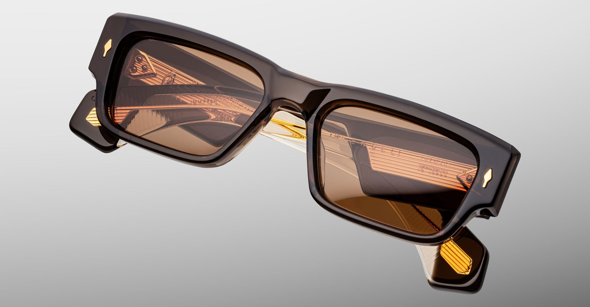 Jacques Marie Mage Engel sunglasses with square black frames and brown-tinted lenses shown from the front angle.