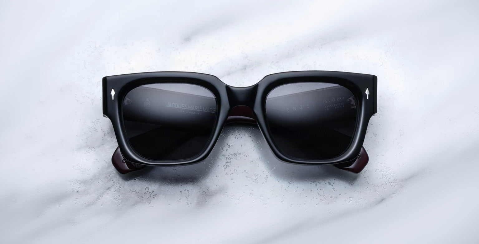 Jacques Marie Mage Enzo black rectangular sunglasses with dark lenses, front view.