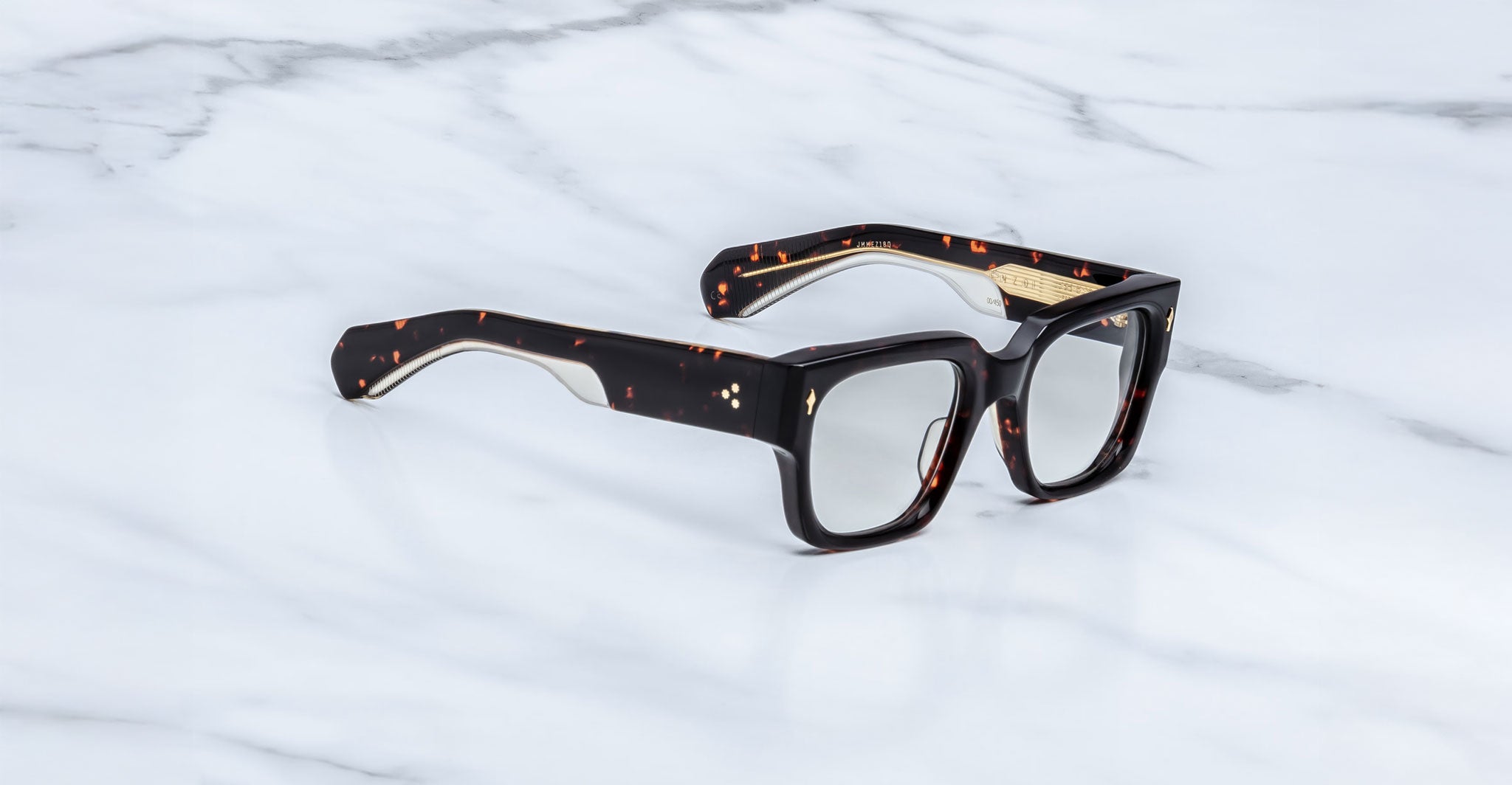 Jacques Marie Mage Enzo eyeglasses with thick rectangular tortoiseshell frames, top view.