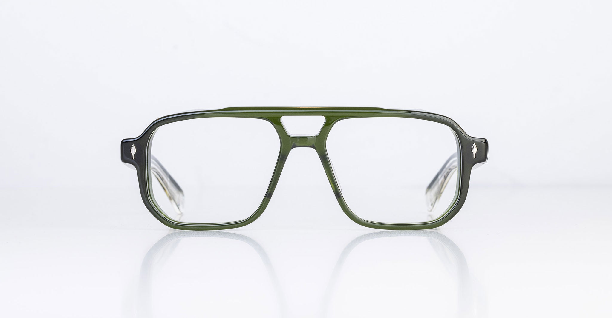 The Jacques Marie Mage Evans by Jacques Marie Mage is a pair of green rectangular eyeglasses featuring a thick, oversized acetate frame, shown from the front against a plain white background.