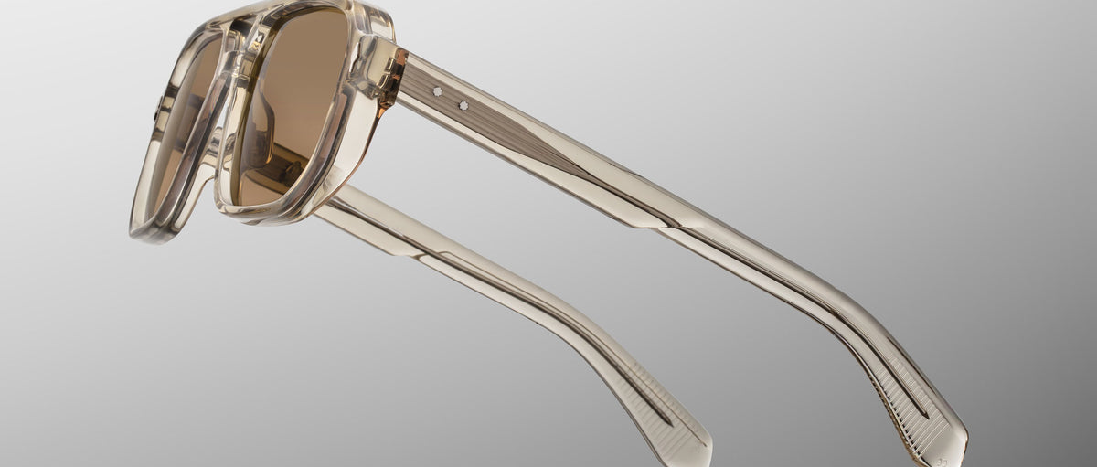 Jacques Marie Mage Evans sunglasses, transparent beige frame, brown lenses, side view.