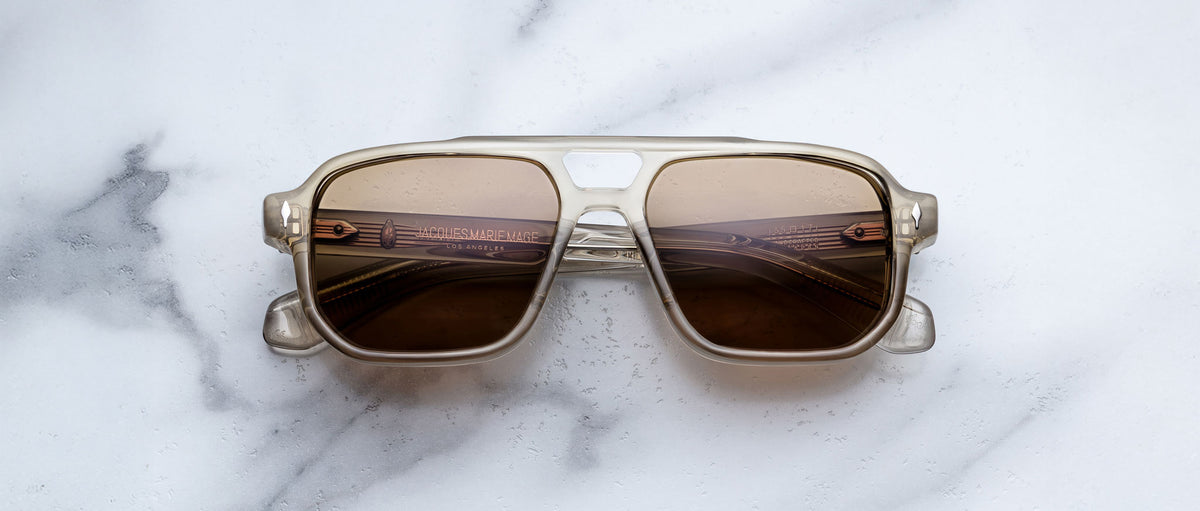 Jacques Marie Mage Evans sunglasses with brown lenses, viewed from above, display the full frame and lens shape.