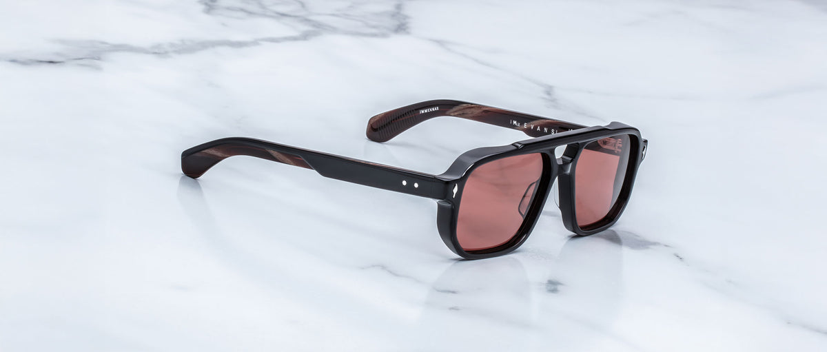 Jacques Marie Mage Evans sunglasses with brown tinted lenses, shown from above.