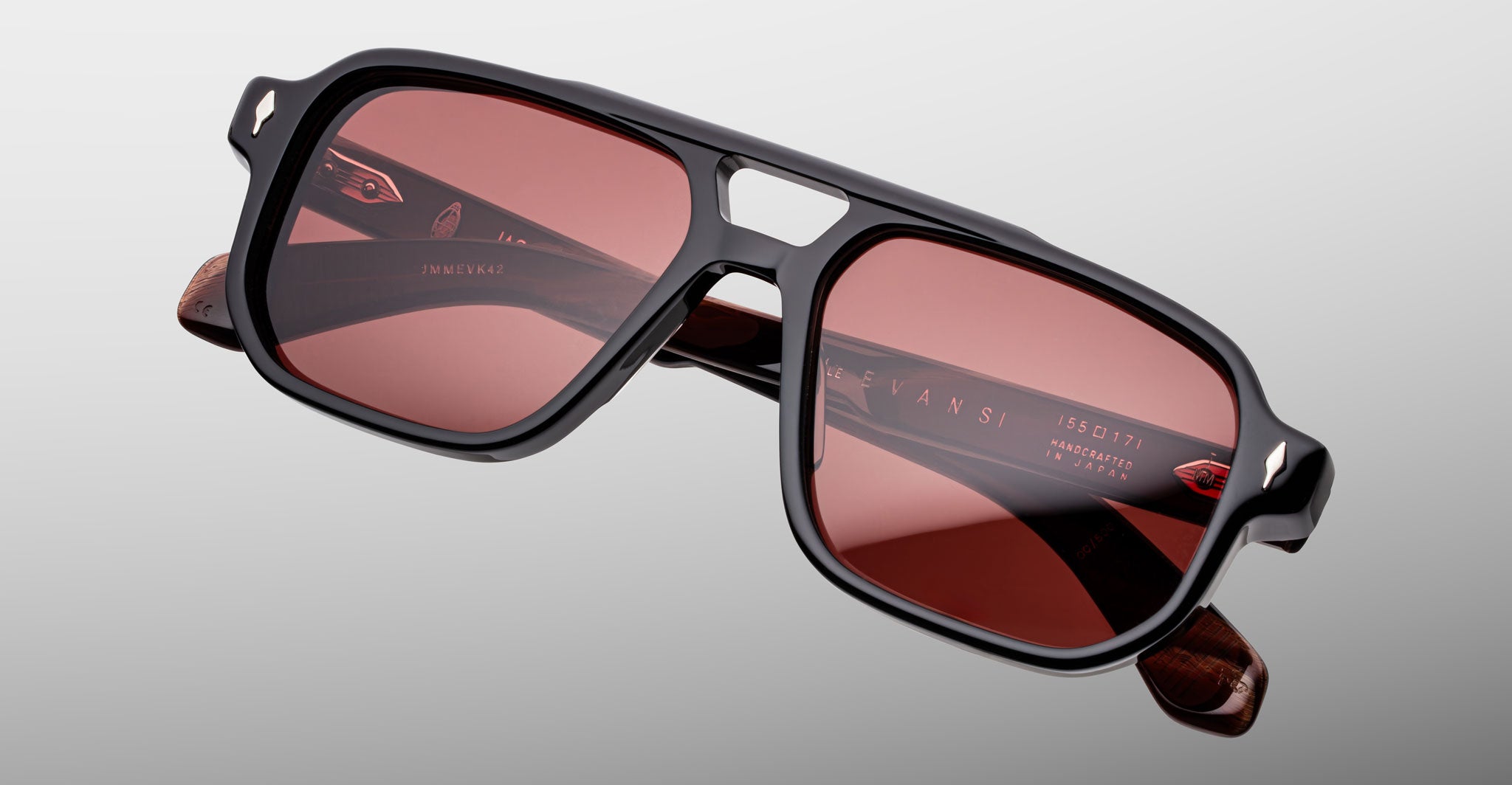 Jacques Marie Mage Evans sunglasses, black frames, red lenses, front view.