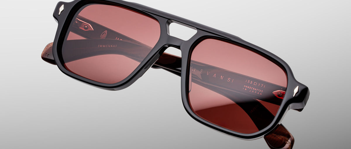 Jacques Marie Mage Evans sunglasses, black frames, red lenses, front view.