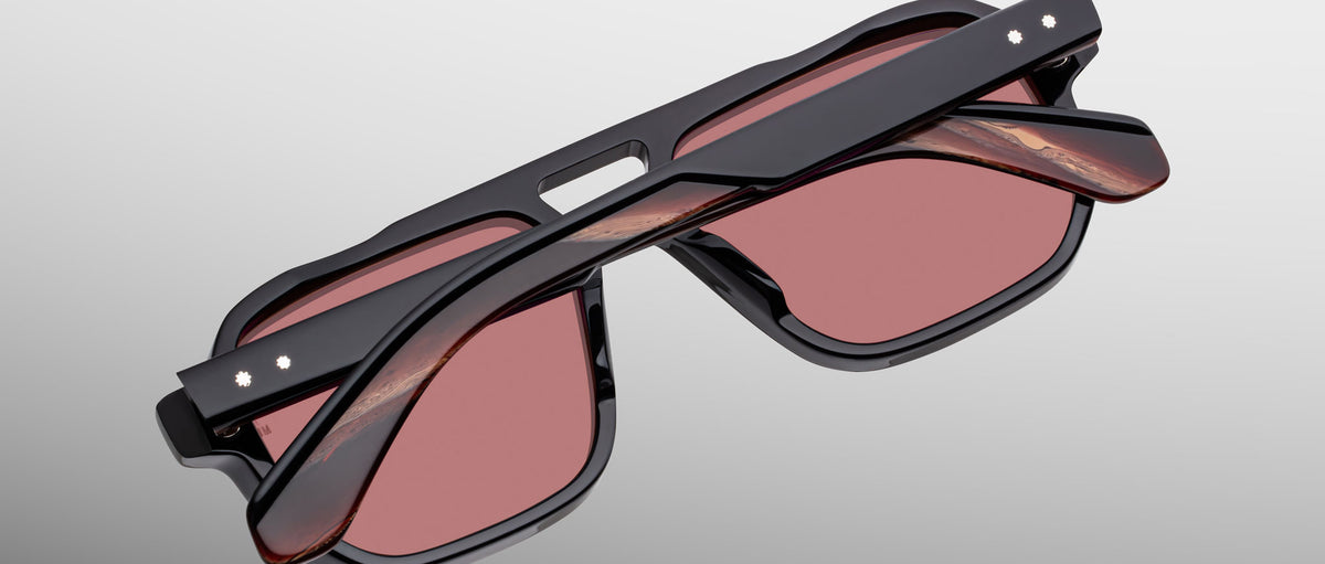 Jacques Marie Mage Evans sunglasses, red-tinted lenses, folded view, luxury eyewear.