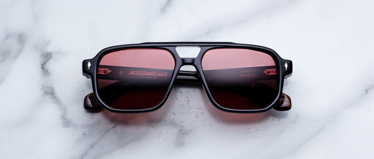 Jacques Marie Mage Evans sunglasses with red lenses, front view, showing round frames and wide temples.