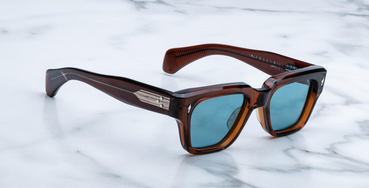 Jacques Marie Mage Fellini sunglasses with blue lenses, top view, showing full frame design.