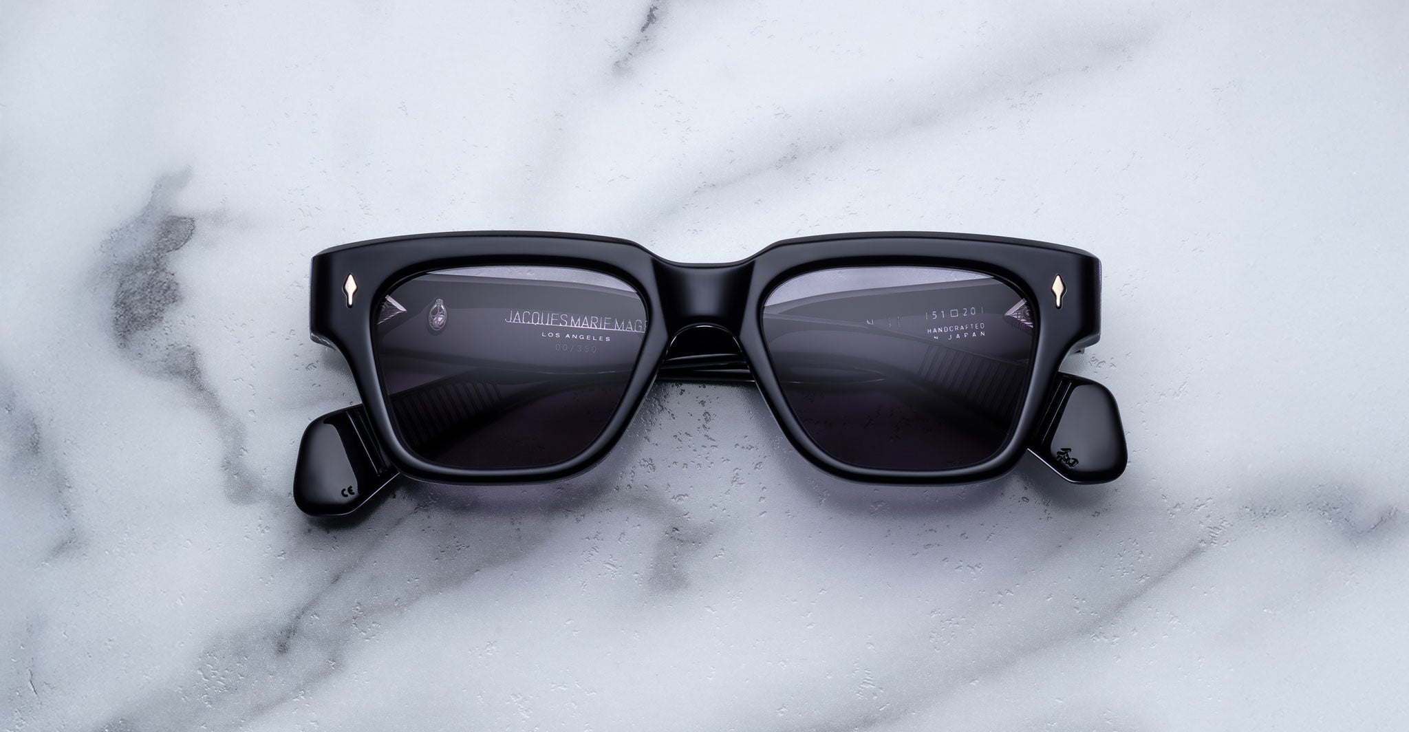 Jacques Marie Mage Fellini rectangular sunglasses with UV lenses, top view.