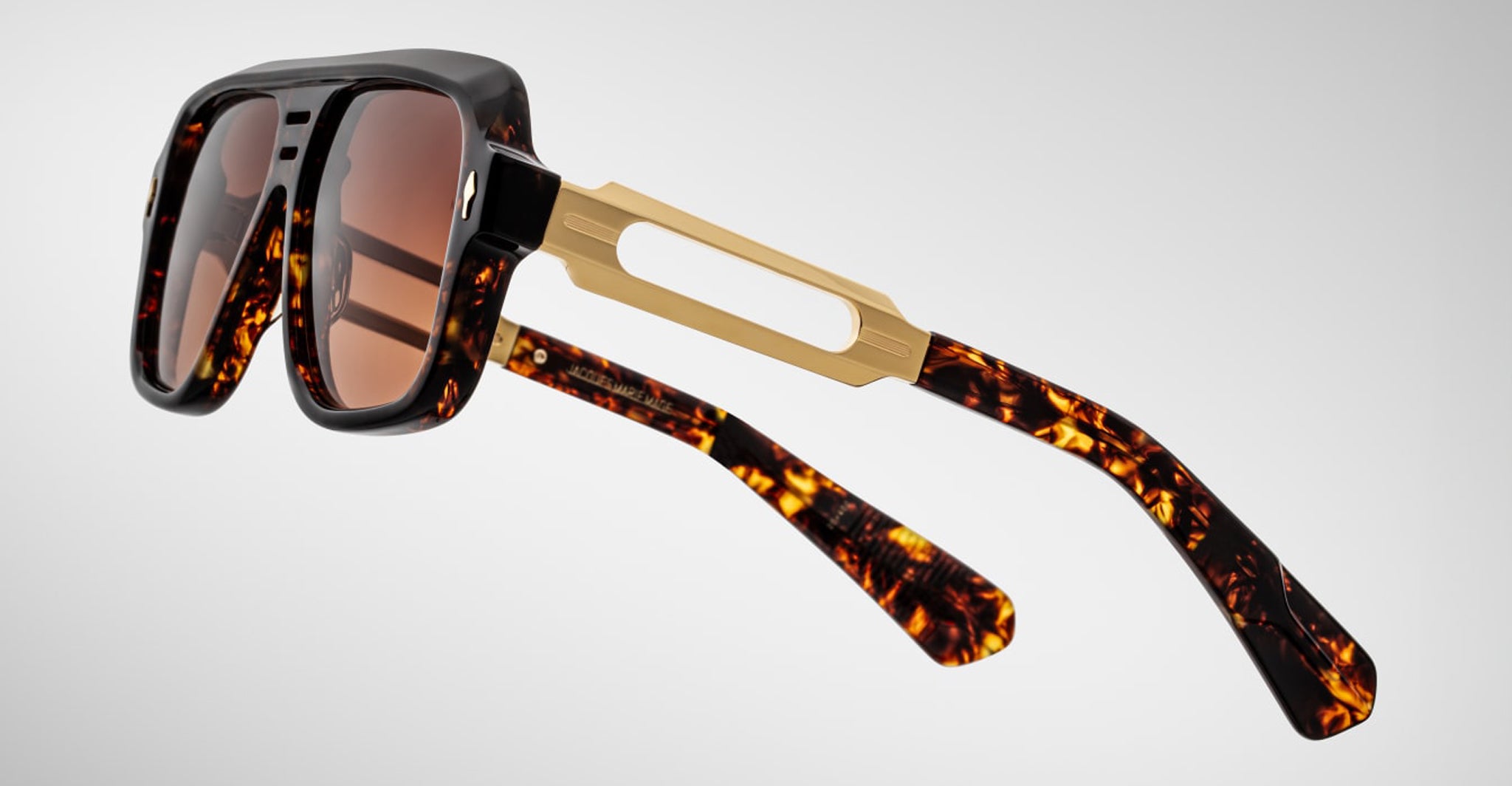 Jacques Marie Mage Fugue square sunglasses with thick tortoiseshell frames, gold temples, and brown lenses, front view.