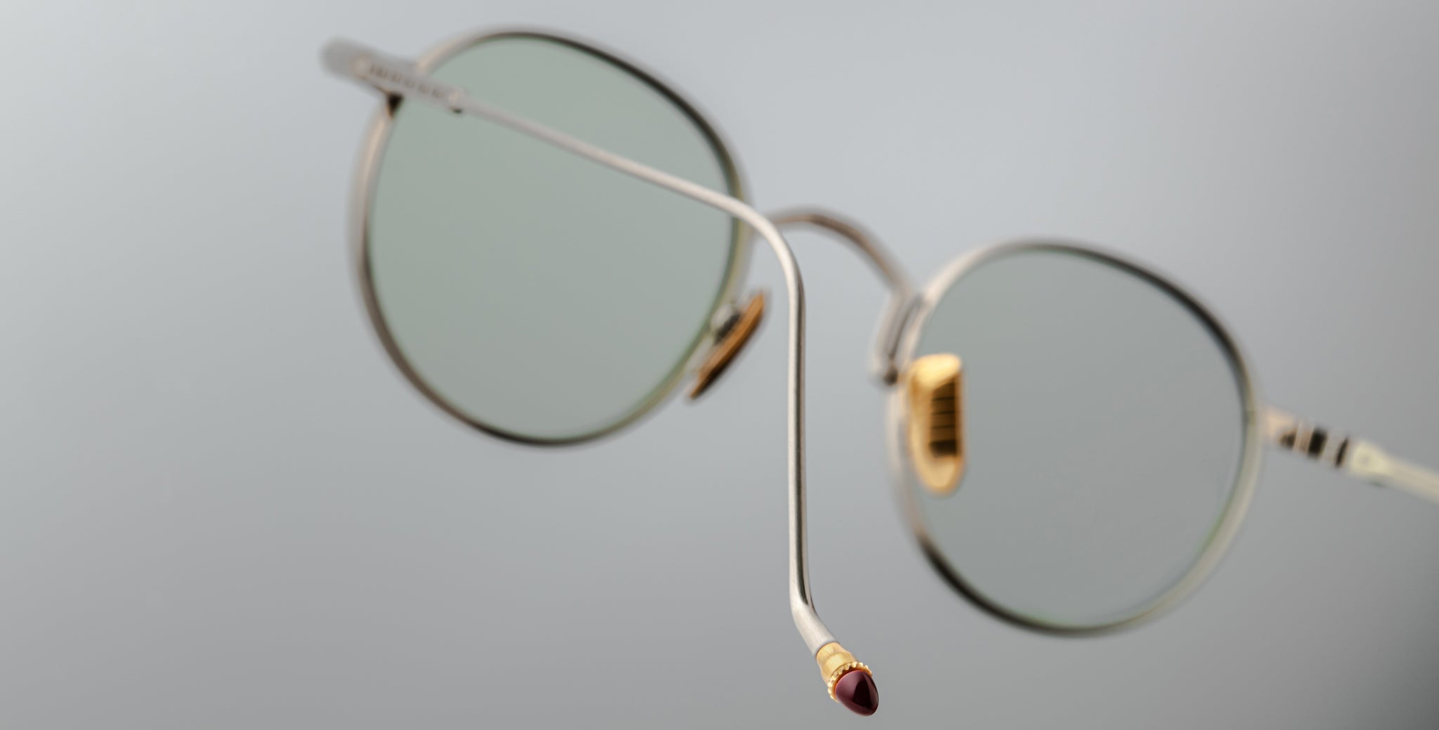 A close-up of Jacques Marie Mage Full Metal Jacket eyeglasses focusing on the temple tips.
