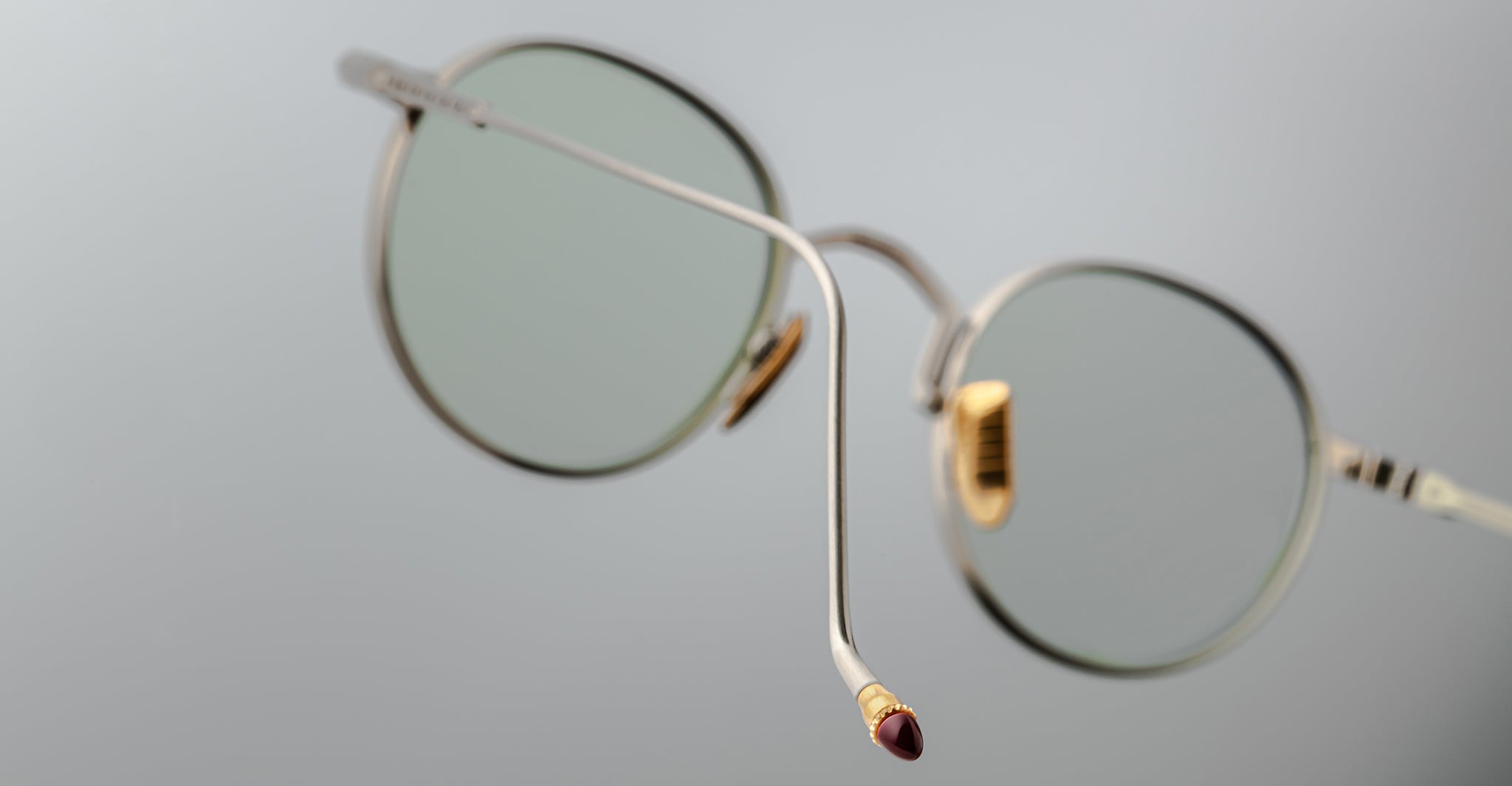 A close-up of Jacques Marie Mage Full Metal Jacket eyeglasses focusing on the temple tips.