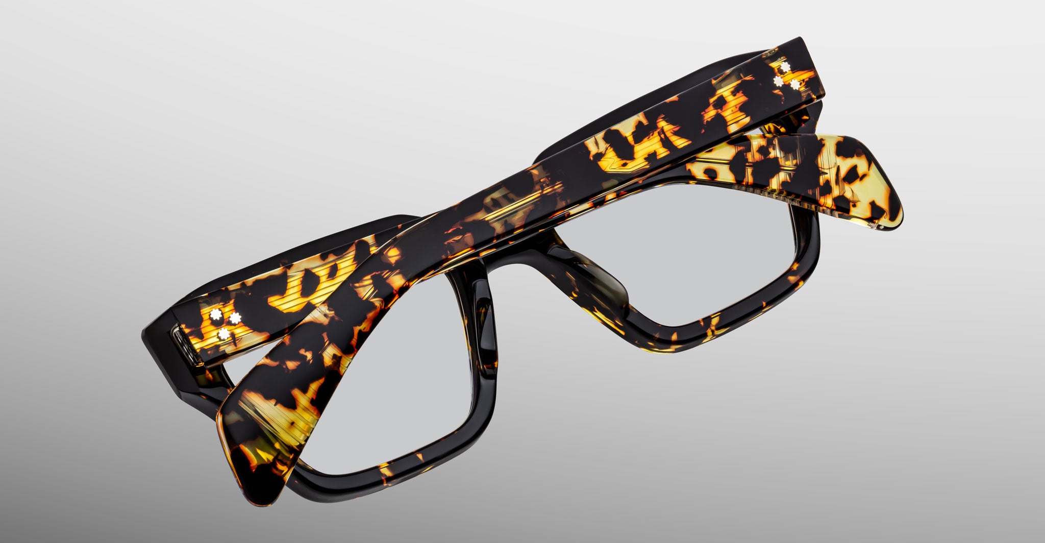 Jacques Marie Mage Ichikawa tortoiseshell eyeglasses, folded, viewed from above.