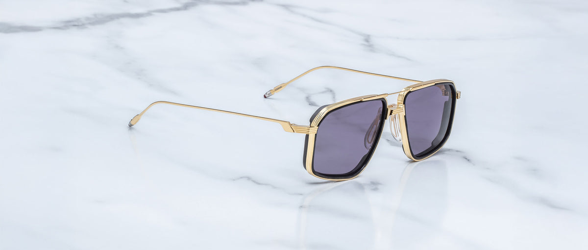 Jacques Marie Mage Jagger aviator sunglasses with dark lenses, front view.