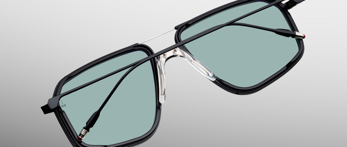Jacques Marie Mage Jagger black aviator eyeglasses with UV green-tinted lenses, front view.
