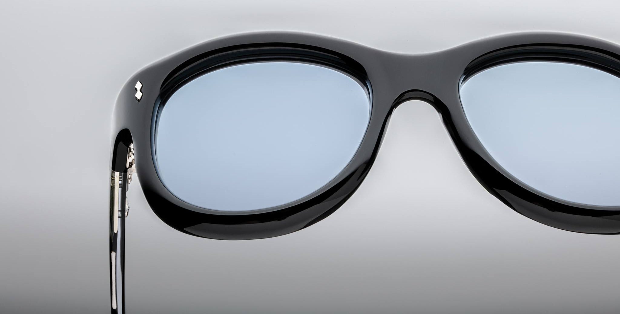 Jacques Marie Mage Jennie black sunglasses with blue lenses, front view, designer eyewear.