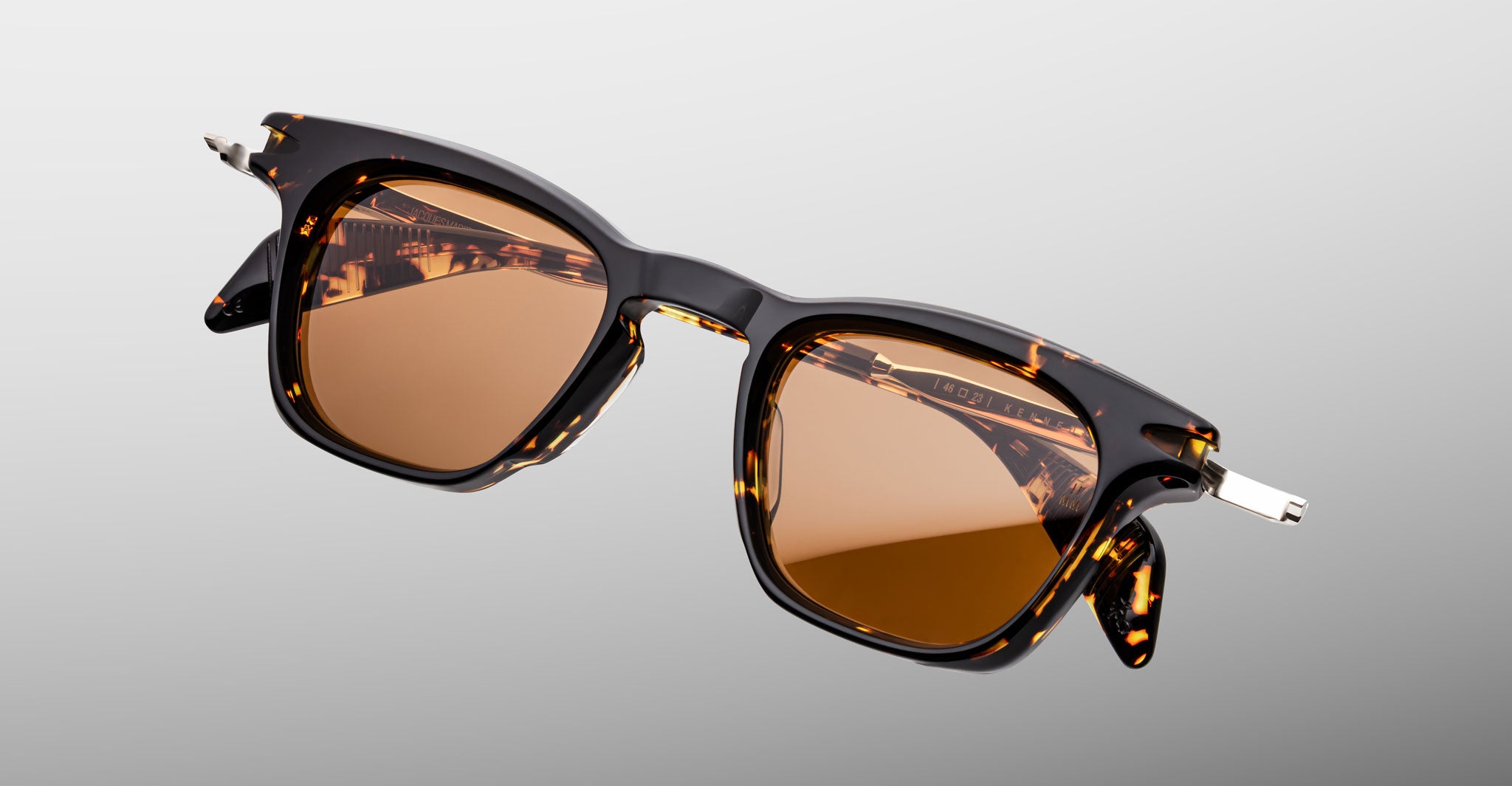 Jacques Marie Mage Kennedy rectangular tortoiseshell sunglasses with brown UV-protection lenses, front-facing view.