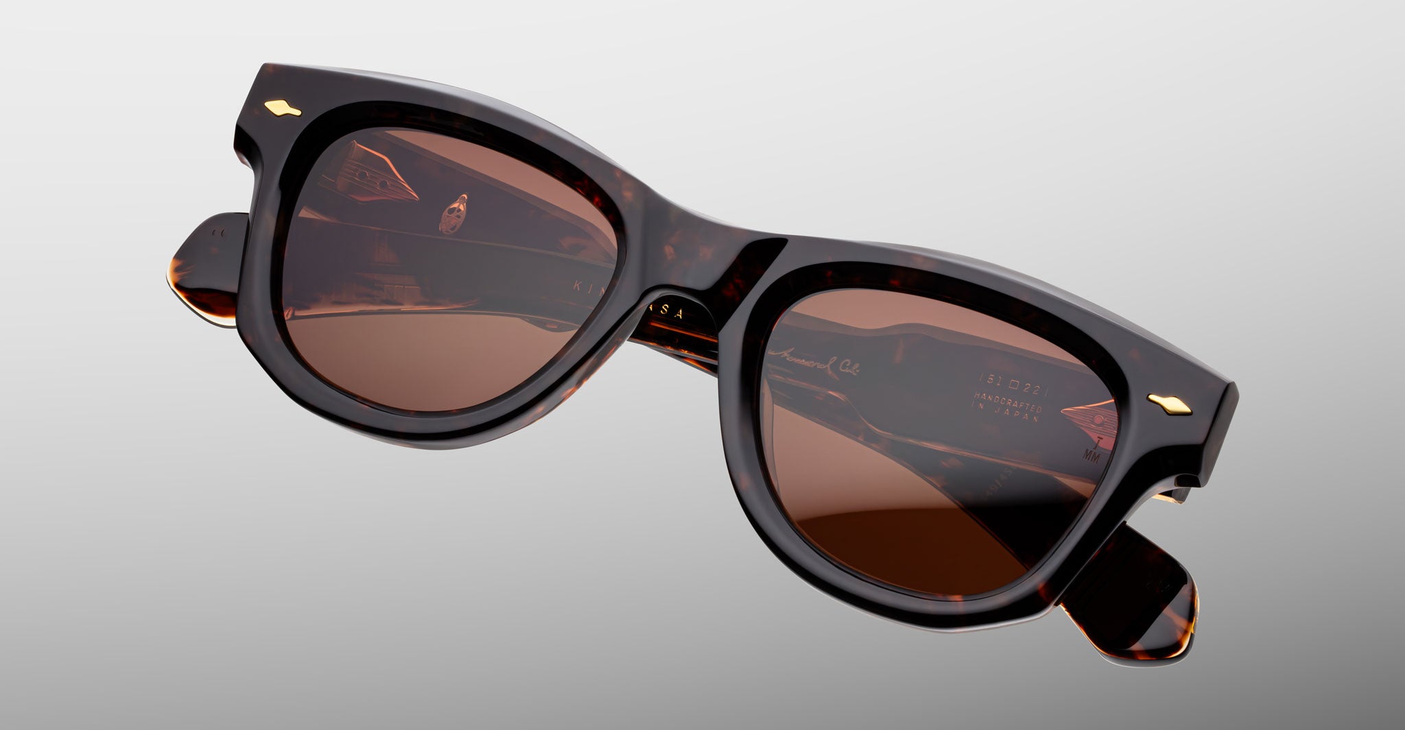 Jacques Marie Mage Kinshasa sunglasses, tortoiseshell square frames, brown lenses, front view.