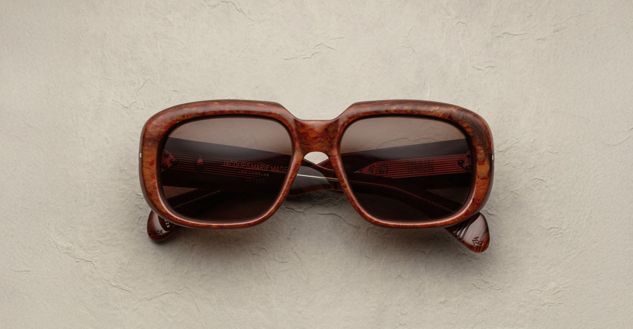 Jacques Marie Mage Kobo square brown tortoiseshell sunglasses with dark lenses, front view.